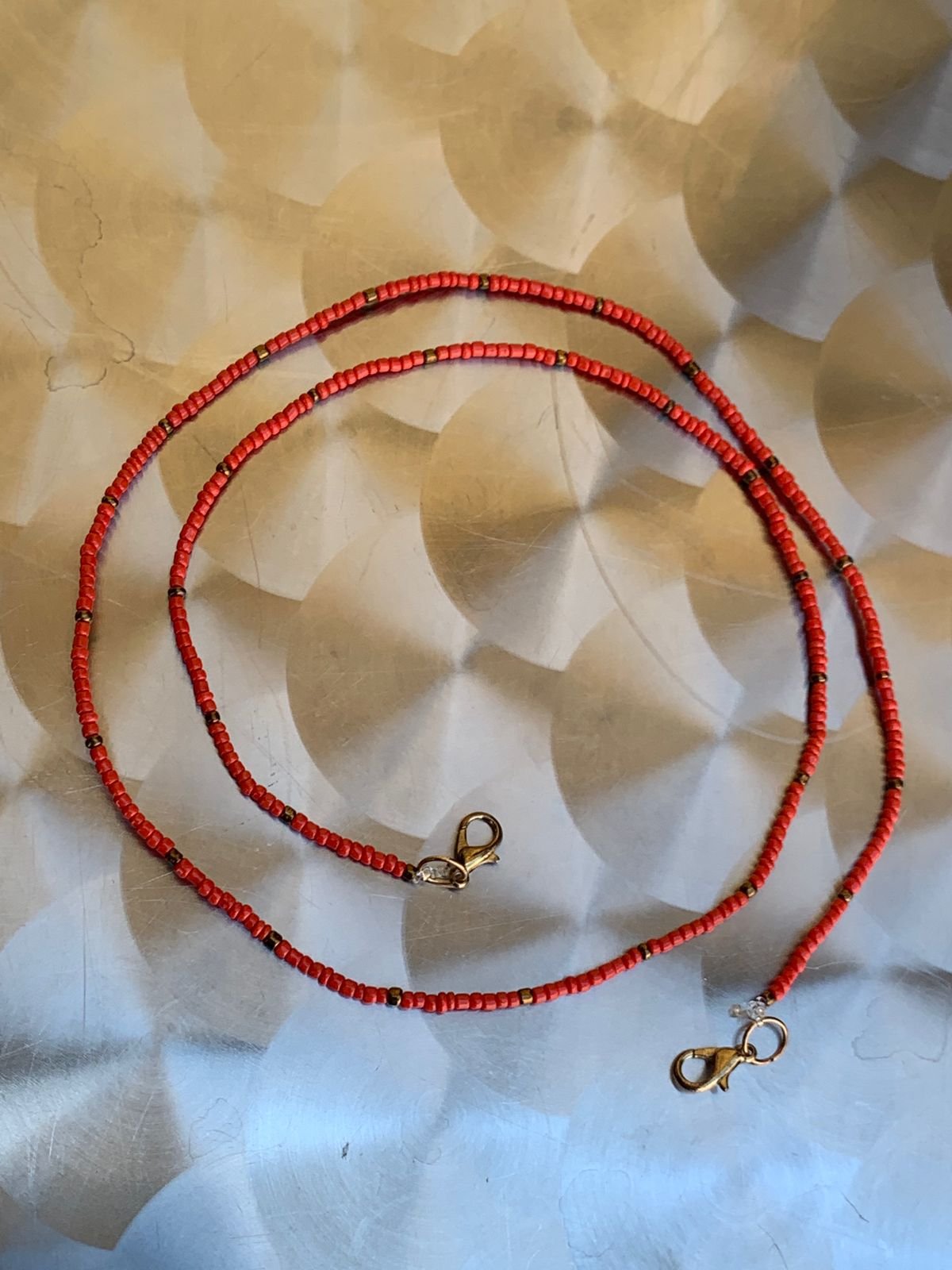 Sujetador de mascarilla rojo