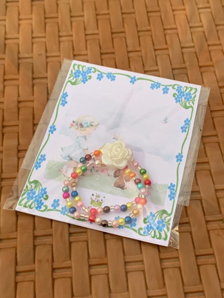 Pulsera con dije de rosa